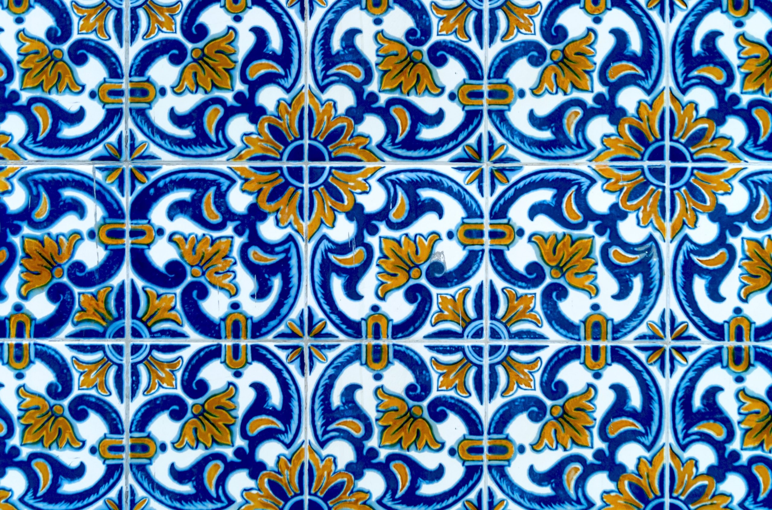 background-photograph-of-antique-portuguese-tile-pattern-in-blue-and-yellow-color (1)